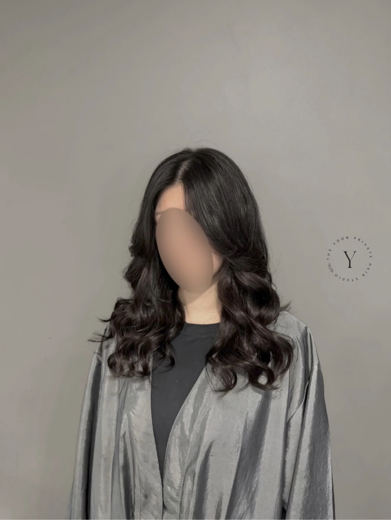 Dark voluminous curls styled at The Yoon Hair Studio